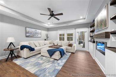 Welcome home to this well-maintained 4-bedroom, 2.5-bath on Woodlake Country Club in North Carolina - for sale on GolfHomes.com, golf home, golf lot