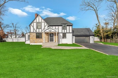 Set on a rare double lot in the Nassau Shores section of East on Peninsula Golf Club in New York - for sale on GolfHomes.com, golf home, golf lot