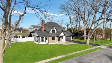 Set on a rare double lot in the Nassau Shores section of East on Peninsula Golf Club in New York - for sale on GolfHomes.com, golf home, golf lot