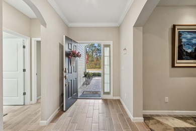 Experience The Perfect Blend Of Modern Luxury And Coastal on Golf Club At North Hampton in Florida - for sale on GolfHomes.com, golf home, golf lot