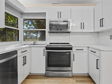 Reintroduced to the market - fully refreshed and move-in ready! on Inverrary Country Club in Florida - for sale on GolfHomes.com, golf home, golf lot