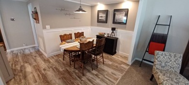 Come settle down and relax in a beautiful, manufactured home on Fairways Country Club in Florida - for sale on GolfHomes.com, golf home, golf lot