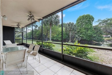 Lovely light and bright first floor corner unit overlooking the on Deer Creek Golf Club in Florida - for sale on GolfHomes.com, golf home, golf lot