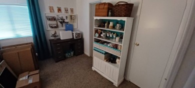 Come settle down and relax in a beautiful, manufactured home on Fairways Country Club in Florida - for sale on GolfHomes.com, golf home, golf lot