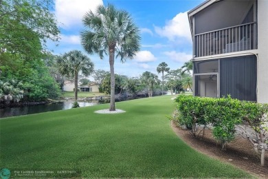 Lovely light and bright first floor corner unit overlooking the on Deer Creek Golf Club in Florida - for sale on GolfHomes.com, golf home, golf lot