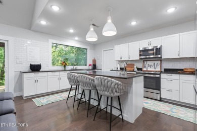 Over 4,000 square feet, 5 bedroom, 3.5 bath basement rancher in on River Islands Golf Club in Tennessee - for sale on GolfHomes.com, golf home, golf lot