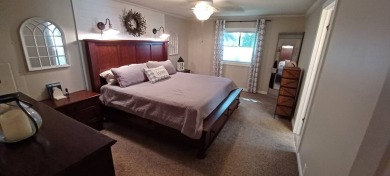 Come settle down and relax in a beautiful, manufactured home on Fairways Country Club in Florida - for sale on GolfHomes.com, golf home, golf lot