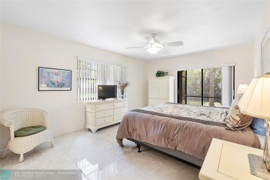 Lovely light and bright first floor corner unit overlooking the on Deer Creek Golf Club in Florida - for sale on GolfHomes.com, golf home, golf lot