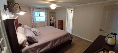 Come settle down and relax in a beautiful, manufactured home on Fairways Country Club in Florida - for sale on GolfHomes.com, golf home, golf lot