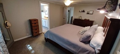 Come settle down and relax in a beautiful, manufactured home on Fairways Country Club in Florida - for sale on GolfHomes.com, golf home, golf lot