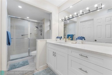Lovely light and bright first floor corner unit overlooking the on Deer Creek Golf Club in Florida - for sale on GolfHomes.com, golf home, golf lot