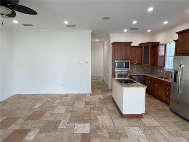 Clean and well kept Golf Course located courtyard property on Reunion Resort Golf Course in Florida - for sale on GolfHomes.com, golf home, golf lot