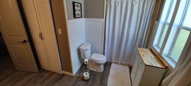 Come settle down and relax in a beautiful, manufactured home on Fairways Country Club in Florida - for sale on GolfHomes.com, golf home, golf lot