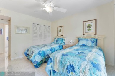 Lovely light and bright first floor corner unit overlooking the on Deer Creek Golf Club in Florida - for sale on GolfHomes.com, golf home, golf lot