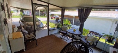 Come settle down and relax in a beautiful, manufactured home on Fairways Country Club in Florida - for sale on GolfHomes.com, golf home, golf lot