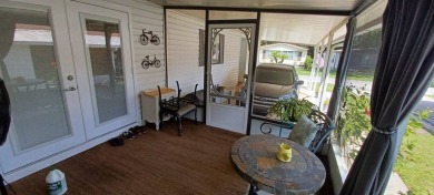 Come settle down and relax in a beautiful, manufactured home on Fairways Country Club in Florida - for sale on GolfHomes.com, golf home, golf lot