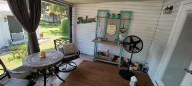 Come settle down and relax in a beautiful, manufactured home on Fairways Country Club in Florida - for sale on GolfHomes.com, golf home, golf lot
