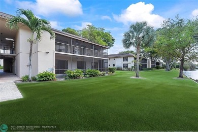Lovely light and bright first floor corner unit overlooking the on Deer Creek Golf Club in Florida - for sale on GolfHomes.com, golf home, golf lot