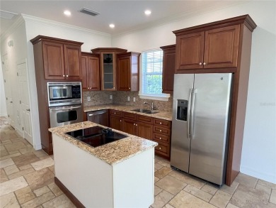 Clean and well kept Golf Course located courtyard property on Reunion Resort Golf Course in Florida - for sale on GolfHomes.com, golf home, golf lot