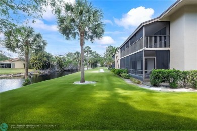 Lovely light and bright first floor corner unit overlooking the on Deer Creek Golf Club in Florida - for sale on GolfHomes.com, golf home, golf lot