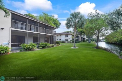Lovely light and bright first floor corner unit overlooking the on Deer Creek Golf Club in Florida - for sale on GolfHomes.com, golf home, golf lot