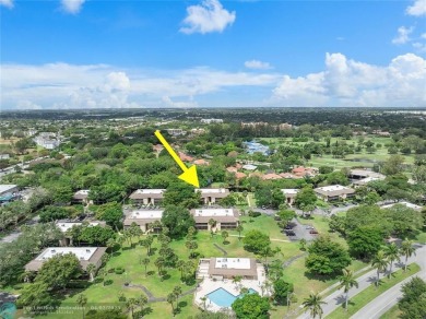 Lovely light and bright first floor corner unit overlooking the on Deer Creek Golf Club in Florida - for sale on GolfHomes.com, golf home, golf lot