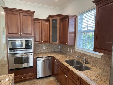 Clean and well kept Golf Course located courtyard property on Reunion Resort Golf Course in Florida - for sale on GolfHomes.com, golf home, golf lot