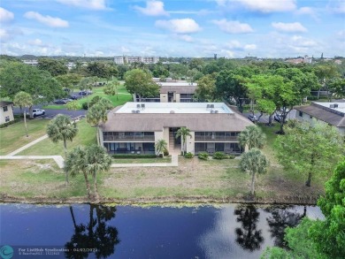 Lovely light and bright first floor corner unit overlooking the on Deer Creek Golf Club in Florida - for sale on GolfHomes.com, golf home, golf lot