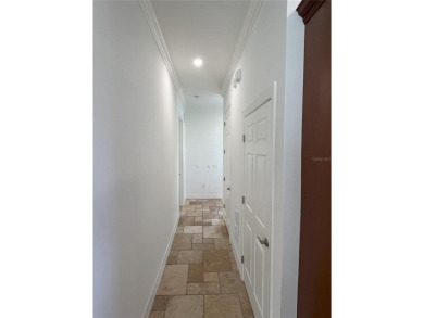 Clean and well kept Golf Course located courtyard property on Reunion Resort Golf Course in Florida - for sale on GolfHomes.com, golf home, golf lot