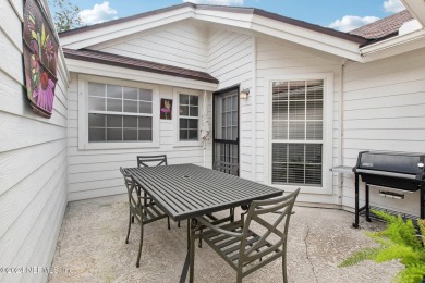 Sunlight abounds in this perfect 3/2 villa with newer A/C on Magnolia Point Golf and Country Club in Florida - for sale on GolfHomes.com, golf home, golf lot