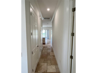 Clean and well kept Golf Course located courtyard property on Reunion Resort Golf Course in Florida - for sale on GolfHomes.com, golf home, golf lot