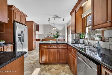 This well-maintained brick home is situated on nearly a on Pine Valley Country Club in North Carolina - for sale on GolfHomes.com, golf home, golf lot