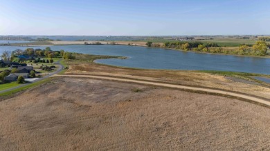 Over half acre lot with 100 feet of shoreline on Lake Albert on Lake Region Golf Course in South Dakota - for sale on GolfHomes.com, golf home, golf lot