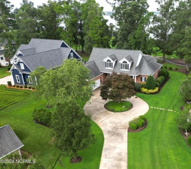 Beautiful sunset views over 17th hole, marina and Yeopim River on Sound Golf Links at Albemarle Plantation in North Carolina - for sale on GolfHomes.com, golf home, golf lot