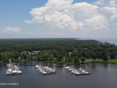 Beautiful sunset views over 17th hole, marina and Yeopim River on Sound Golf Links at Albemarle Plantation in North Carolina - for sale on GolfHomes.com, golf home, golf lot