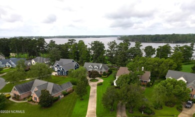 Beautiful sunset views over 17th hole, marina and Yeopim River on Sound Golf Links at Albemarle Plantation in North Carolina - for sale on GolfHomes.com, golf home, golf lot