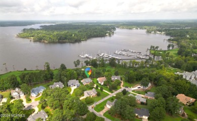 Beautiful sunset views over 17th hole, marina and Yeopim River on Sound Golf Links at Albemarle Plantation in North Carolina - for sale on GolfHomes.com, golf home, golf lot