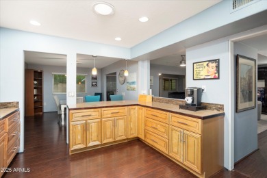 This lovely three-bedroom, two-bath home in Sun City features a on Sun City Country Club in Arizona - for sale on GolfHomes.com, golf home, golf lot