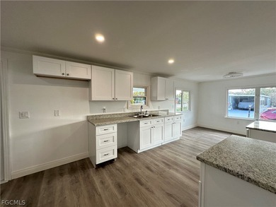 Move into a home that feels like brand-new construction in the on Riverbend Golf and Country Club in Florida - for sale on GolfHomes.com, golf home, golf lot