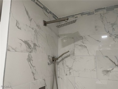 Move into a home that feels like brand-new construction in the on Riverbend Golf and Country Club in Florida - for sale on GolfHomes.com, golf home, golf lot