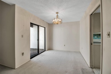 Discover the potential in this spacious 3bd/3ba townhome located on IMG Academies Golf and Country Club in Florida - for sale on GolfHomes.com, golf home, golf lot