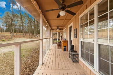 Enjoy this darling 2 bedroom & 2 bath home on two lots with two on Holly Lake Ranch Golf Club in Texas - for sale on GolfHomes.com, golf home, golf lot