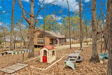 Enjoy this darling 2 bedroom & 2 bath home on two lots with two on Holly Lake Ranch Golf Club in Texas - for sale on GolfHomes.com, golf home, golf lot
