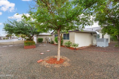 This lovely three-bedroom, two-bath home in Sun City features a on Sun City Country Club in Arizona - for sale on GolfHomes.com, golf home, golf lot