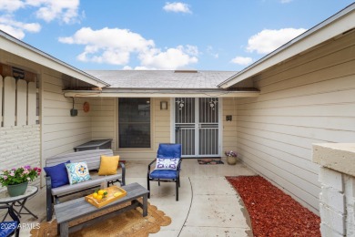 This lovely three-bedroom, two-bath home in Sun City features a on Sun City Country Club in Arizona - for sale on GolfHomes.com, golf home, golf lot