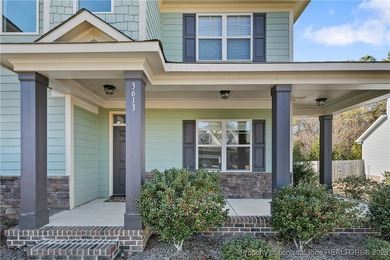 GATES FOUR - Guarded/Gated/Golf Community. Two Story Stone & on Gates Four Golf and Country Club in North Carolina - for sale on GolfHomes.com, golf home, golf lot