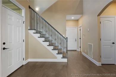 GATES FOUR - Guarded/Gated/Golf Community. Two Story Stone & on Gates Four Golf and Country Club in North Carolina - for sale on GolfHomes.com, golf home, golf lot