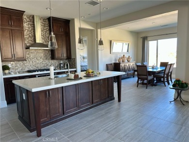 This home comes with approximately $300,000 in upgrades on Mission Hills Golf Club in California - for sale on GolfHomes.com, golf home, golf lot