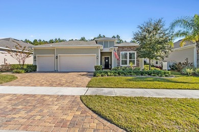 Experience The Perfect Blend Of Modern Luxury And Coastal on Golf Club At North Hampton in Florida - for sale on GolfHomes.com, golf home, golf lot