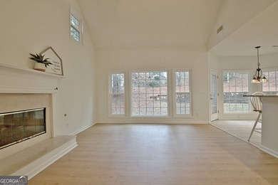 Welcome to this warm and inviting home in the beloved Planterra on Canongate At Planterra Ridge in Georgia - for sale on GolfHomes.com, golf home, golf lot